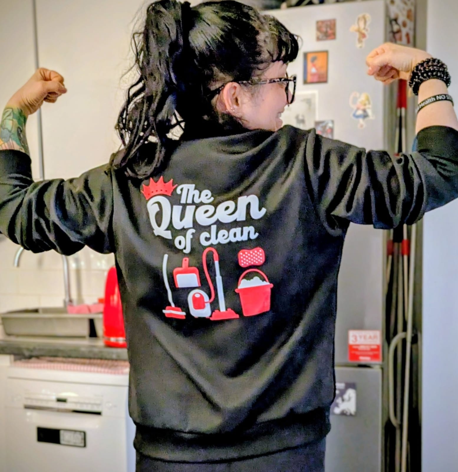 Kari wearing her 'Queen of Clean' hoodie
